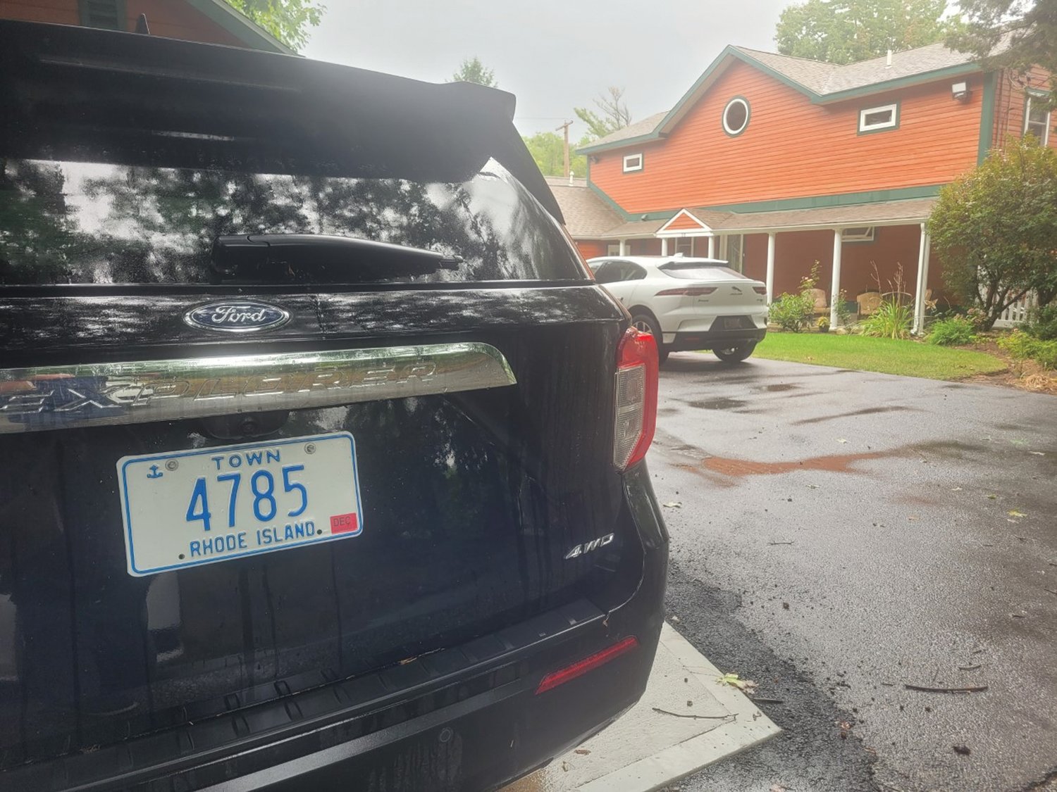 TOWN EMPLOYEE/SENATOR PARKING: A black, four-wheel drive Ford Explorer with a blue and white town license plate sat outside Lombardo’s home at 10 Anson Brown — a small dead-end waterfront street. Next to the Explorer, Lombardo parked his white Jaguar Pace SUV, with “SENATE” license plates.